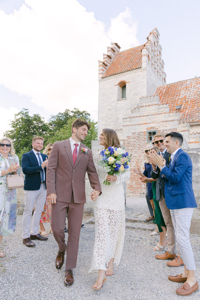 Couple get married in Stevns Klint in Denmark family celebrating