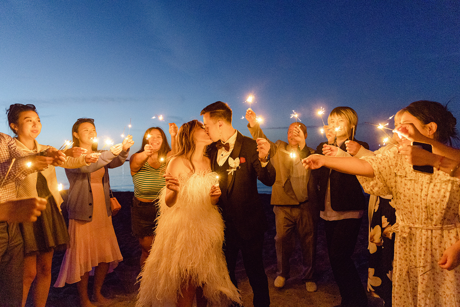 couple get married in denmark fireworks on beach